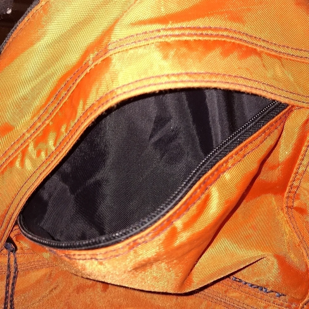Old Navy orange large sling bag. Pre-owned but in good condition.